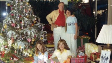 Photo of John Wayne Decorates the Christmas Tree in Vintage Holiday Photo